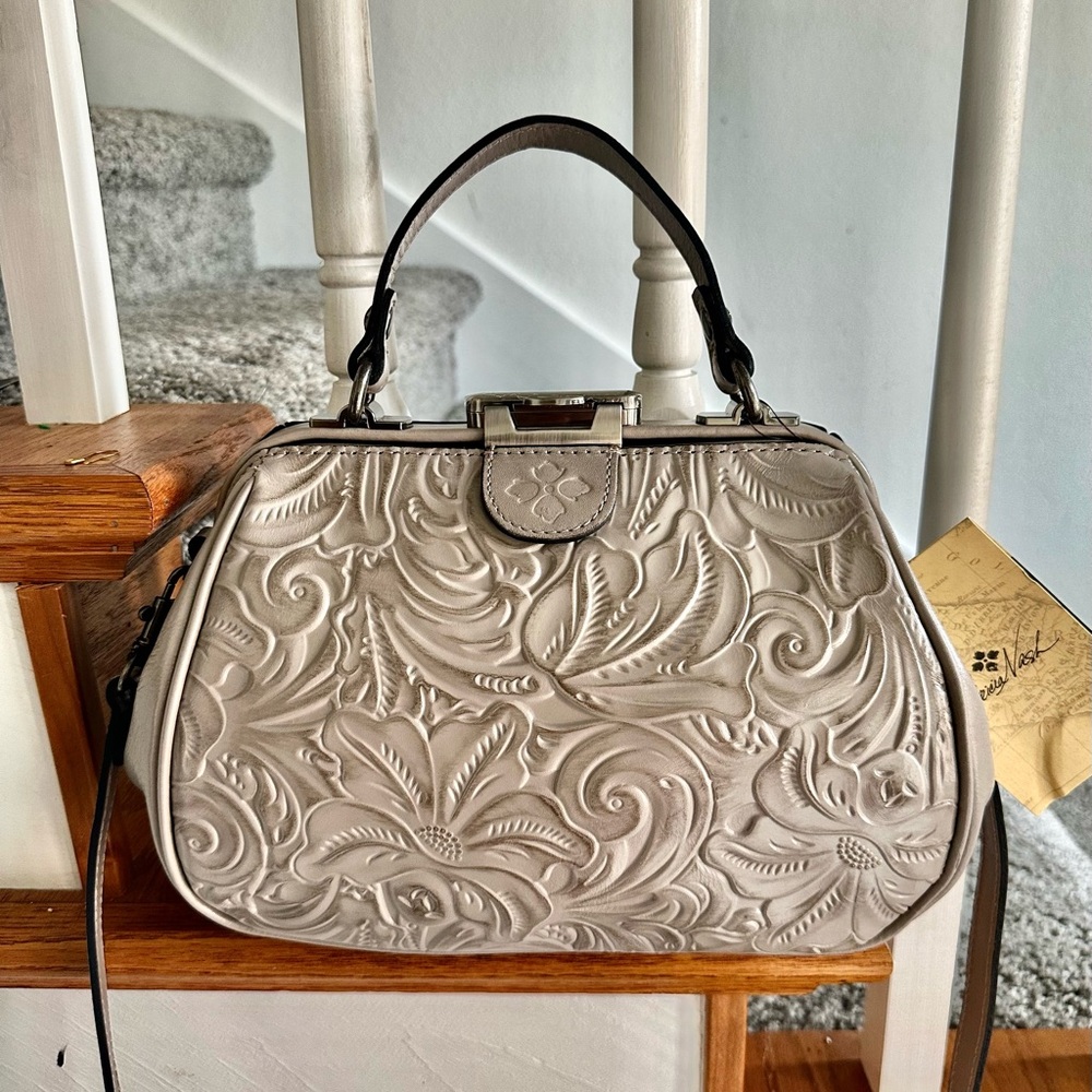 Patricia Nash tooled floral bag new with tags. Comes with a free designer gift